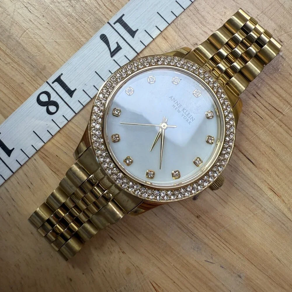 Anne Klein New York Womens Gold-Tone Watch With Crystal Accents & Mother-Of-Pear
